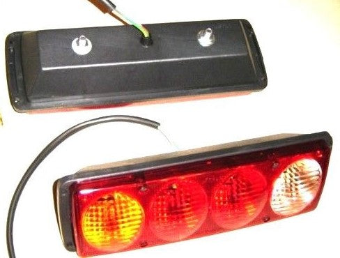 Oval Rear Truck Tail Light – 4 Functions, 310 × 105 × 75 mm, 150 mm Bolt Spacing