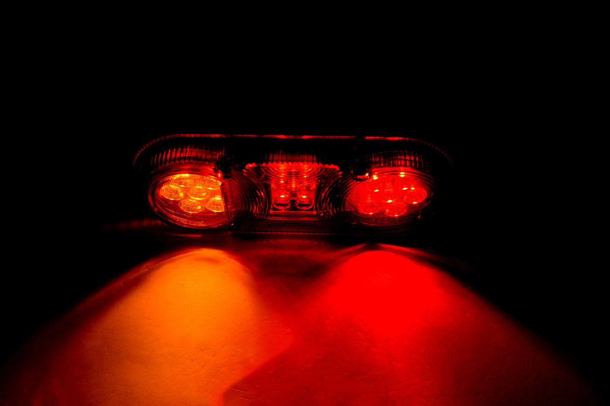 Feu arrière gauche LED ovale, 3 fonctions, 12/24 V, 205×80×53 mm